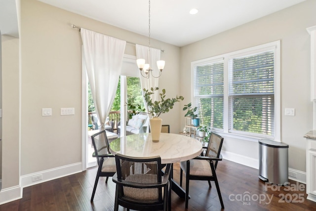 1004 Princesa Dr, Matthews, NC 28104 - dining room featuring an inviting chandelier, baseboards, recessed lighting, and dark wood-style flooring