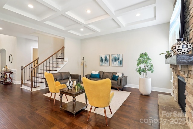 1004 Princesa Dr, Matthews, NC 28104 - living area with stairs, recessed lighting, a stone fireplace, and coffered ceiling