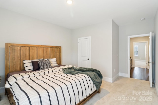 1004 Princesa Dr, Matthews, NC 28104 - bedroom featuring light colored carpet and baseboards