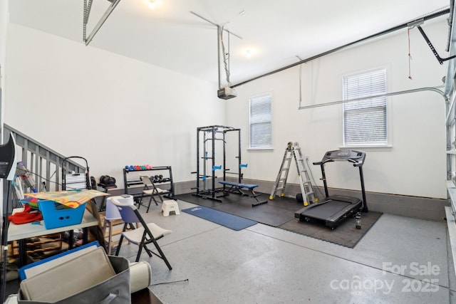 1004 Princesa Dr, Matthews, NC 28104 - workout area featuring a garage and a healthy amount of sunlight