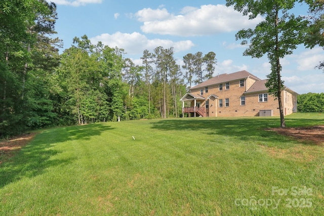 1004 Princesa Dr, Matthews, NC 28104 - view of yard featuring a wooden deck and stairs