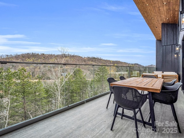 balcony featuring outdoor dining space
