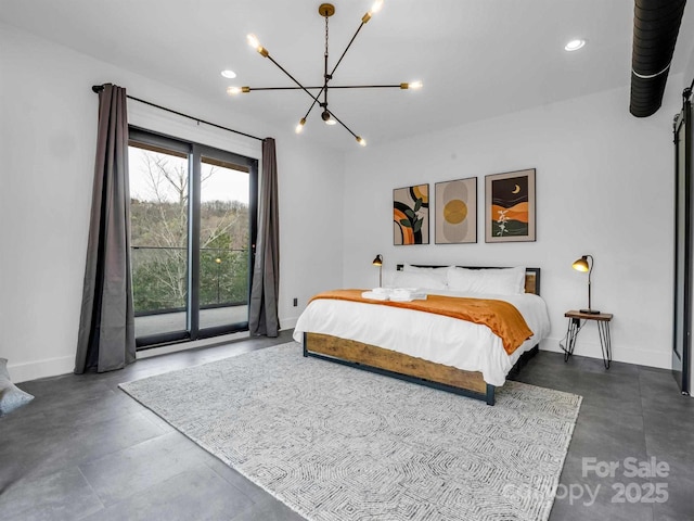 bedroom with baseboards, an inviting chandelier, access to exterior, and finished concrete flooring