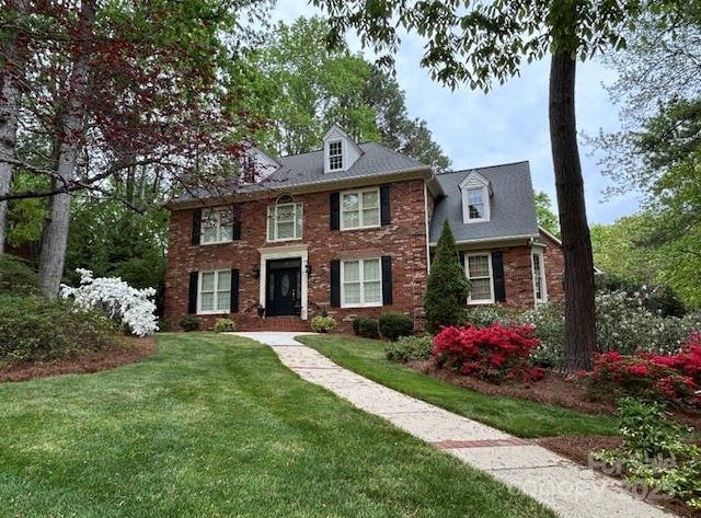3804 Bellingham Ln, Charlotte, NC 28215 - view of front of house with a front yard and brick siding