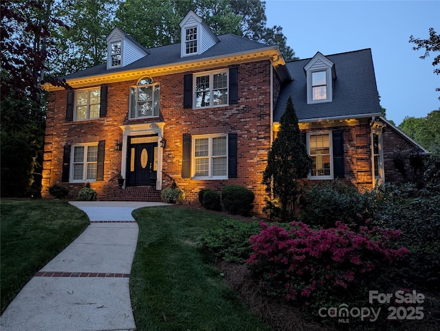 3804 Bellingham Ln, Charlotte, NC 28215 - colonial house featuring brick siding and a front yard