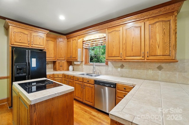 3804 Bellingham Ln, Charlotte, NC 28215 - kitchen with black appliances, tile counters, a sink, backsplash, and recessed lighting