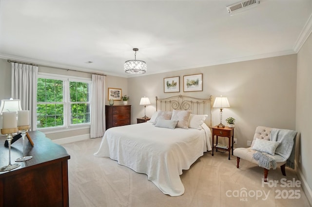 3804 Bellingham Ln, Charlotte, NC 28215 - bedroom featuring light colored carpet, ornamental molding, baseboards, and a chandelier