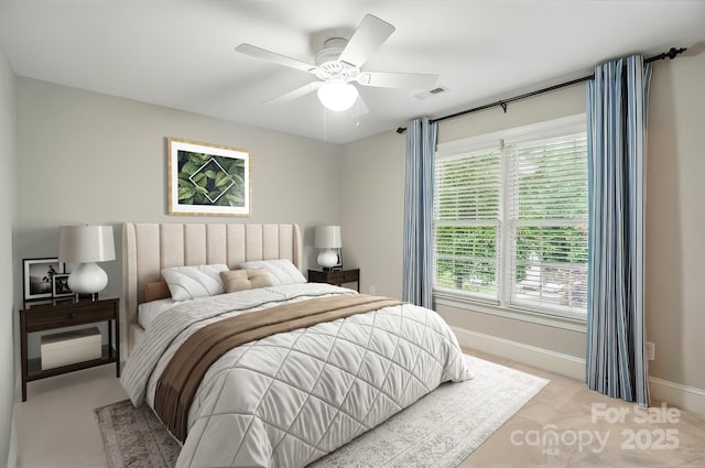 3804 Bellingham Ln, Charlotte, NC 28215 - bedroom featuring baseboards and a ceiling fan