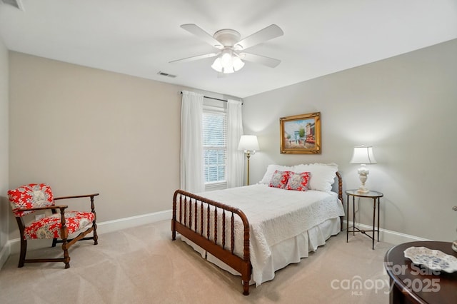 3804 Bellingham Ln, Charlotte, NC 28215 - bedroom with light carpet, baseboards, and a ceiling fan