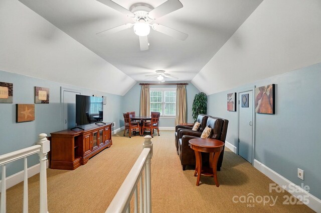 3804 Bellingham Ln, Charlotte, NC 28215 - carpeted living area featuring a ceiling fan, baseboards, and lofted ceiling