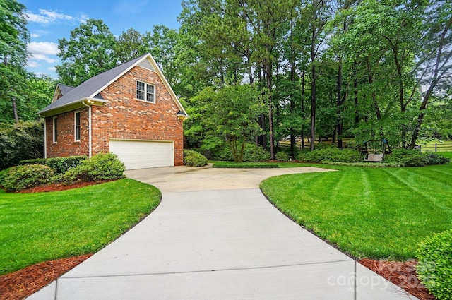 3804 Bellingham Ln, Charlotte, NC 28215 - view of side of property with a garage, concrete driveway, brick siding, and a yard