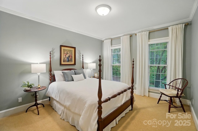3804 Bellingham Ln, Charlotte, NC 28215 - bedroom featuring crown molding, light carpet, and baseboards