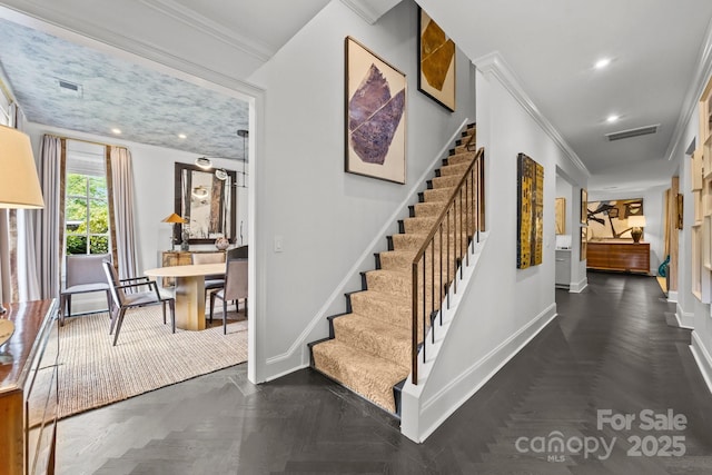1550 High St, Charlotte, NC 28211 - stairway with baseboards, ornamental molding, visible vents, and recessed lighting