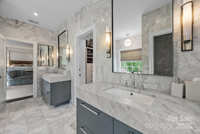 1550 High St, Charlotte, NC 28211 - ensuite bathroom with connected bathroom, tile walls, a sink, and visible vents