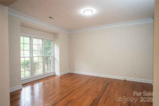 4410 Laurel Twig Ct, Charlotte, NC 28215 - unfurnished room with baseboards, visible vents, ornamental molding, and wood finished floors