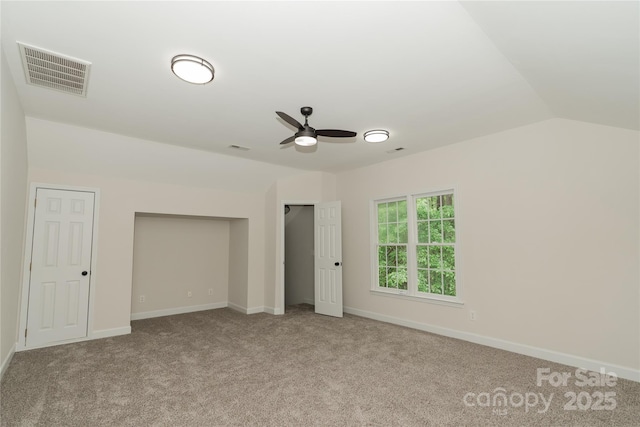 4410 Laurel Twig Ct, Charlotte, NC 28215 - unfurnished bedroom featuring lofted ceiling, visible vents, baseboards, and carpet floors