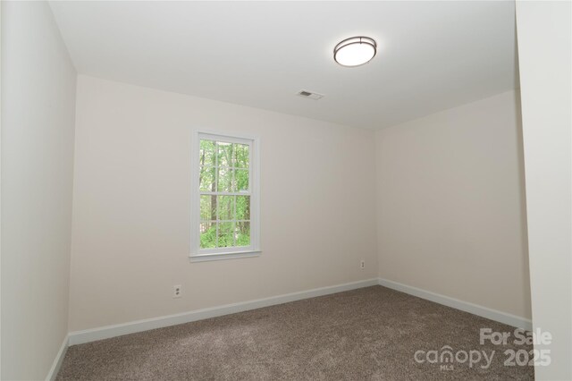 4410 Laurel Twig Ct, Charlotte, NC 28215 - empty room featuring visible vents, carpet, and baseboards
