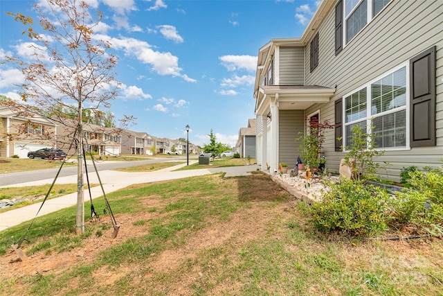 2886 Sherrills Stream Dr, Sherrills Ford, NC 28673 - view of yard with a garage, a residential view, and driveway