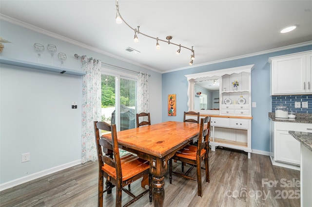 2886 Sherrills Stream Dr, Sherrills Ford, NC 28673 - dining area with dark wood finished floors, baseboards, visible vents, and crown molding