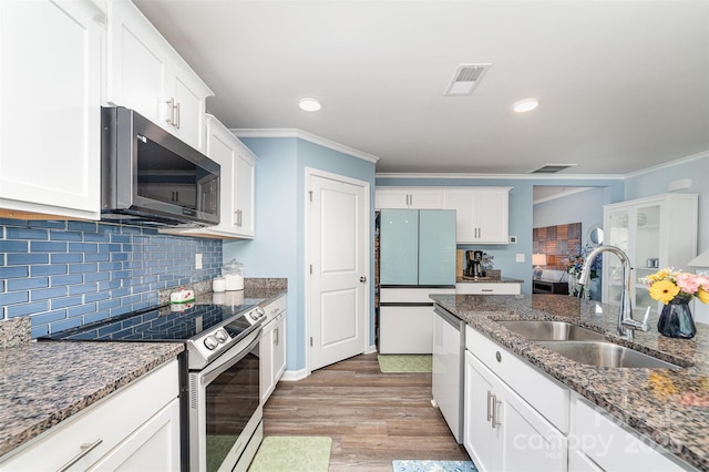 2886 Sherrills Stream Dr, Sherrills Ford, NC 28673 - kitchen with a sink, appliances with stainless steel finishes, visible vents, ornamental molding, and wood finished floors