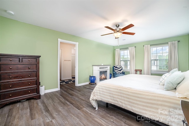 2886 Sherrills Stream Dr, Sherrills Ford, NC 28673 - bedroom featuring dark wood-style floors, ceiling fan, and baseboards