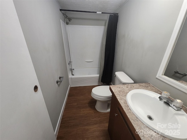 544 Bentley Rd, Shelby, NC 28152 - bathroom featuring shower / tub combo with curtain, vanity, toilet, baseboards, and wood finished floors