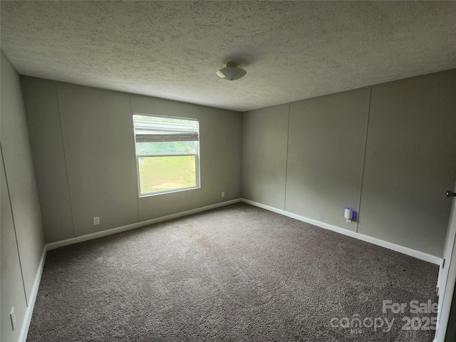 544 Bentley Rd, Shelby, NC 28152 - empty room featuring baseboards, carpet, and a textured ceiling
