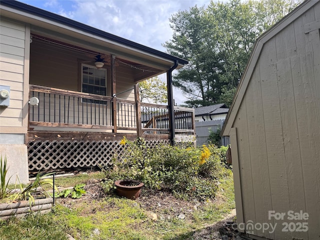 view of home's exterior featuring ceiling fan