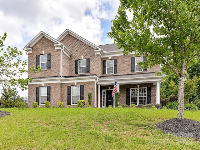 2369 Baxter Pl SE, Concord, NC 28025 - view of front of property featuring a front yard and brick siding