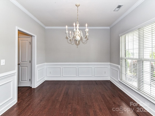 2369 Baxter Pl SE, Concord, NC 28025 - unfurnished room featuring crown molding, a wainscoted wall, a chandelier, and dark wood finished floors