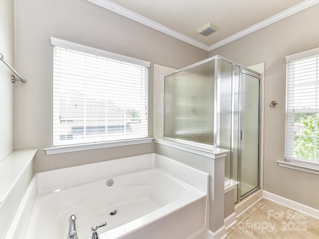 2369 Baxter Pl SE, Concord, NC 28025 - bathroom with tile patterned flooring, a shower stall, ornamental molding, a bath, and visible vents