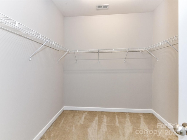 2369 Baxter Pl SE, Concord, NC 28025 - walk in closet with carpet and visible vents
