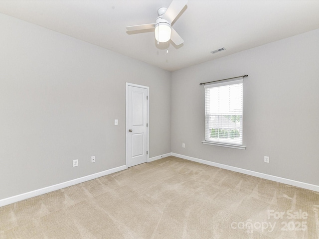2369 Baxter Pl SE, Concord, NC 28025 - spare room featuring baseboards, a ceiling fan, visible vents, and light carpet