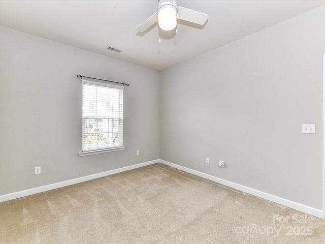 2369 Baxter Pl SE, Concord, NC 28025 - spare room with a ceiling fan, visible vents, carpet floors, and baseboards
