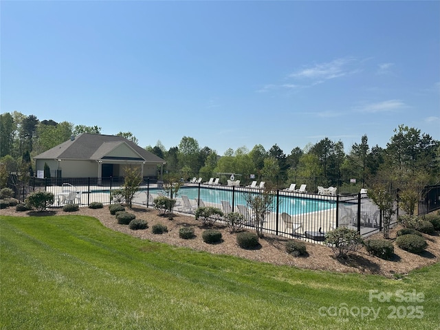 2369 Baxter Pl SE, Concord, NC 28025 - pool featuring fence and a yard