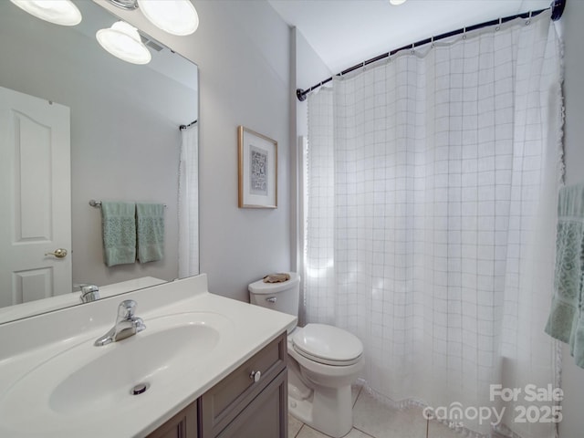 bathroom featuring toilet, a shower with curtain, tile patterned flooring, and vanity