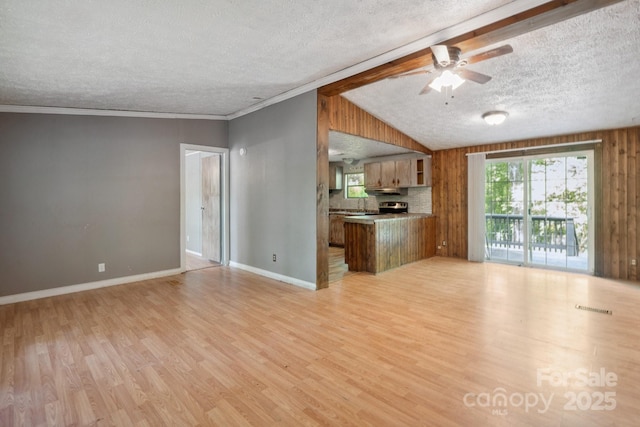 351 Fletcher Rd, Union Grove, NC 28689 - unfurnished living room featuring visible vents, baseboards, a textured ceiling, a ceiling fan, and light wood-style flooring