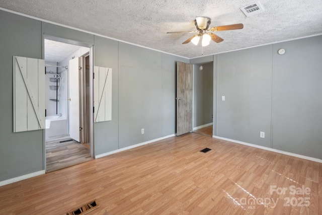 351 Fletcher Rd, Union Grove, NC 28689 - interior space with ceiling fan, visible vents, and wood finished floors