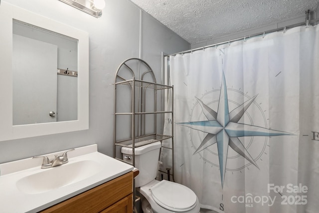 351 Fletcher Rd, Union Grove, NC 28689 - bathroom with vanity, a textured ceiling, curtained shower, and toilet