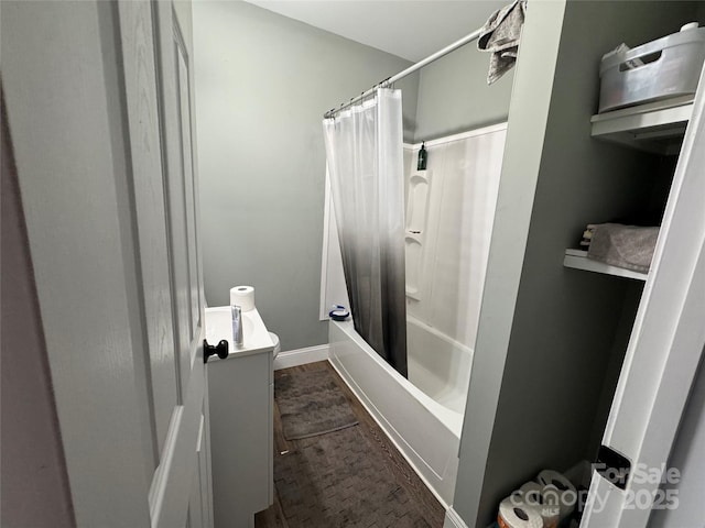 81 Academy Ave NW, Concord, NC 28025 - full bathroom with vanity, shower / tub combo, and baseboards