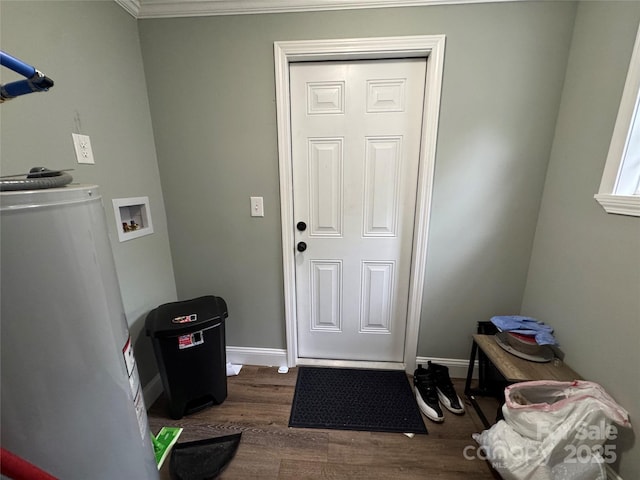 81 Academy Ave NW, Concord, NC 28025 - laundry room with washer hookup, dark wood-type flooring, ornamental molding, and baseboards