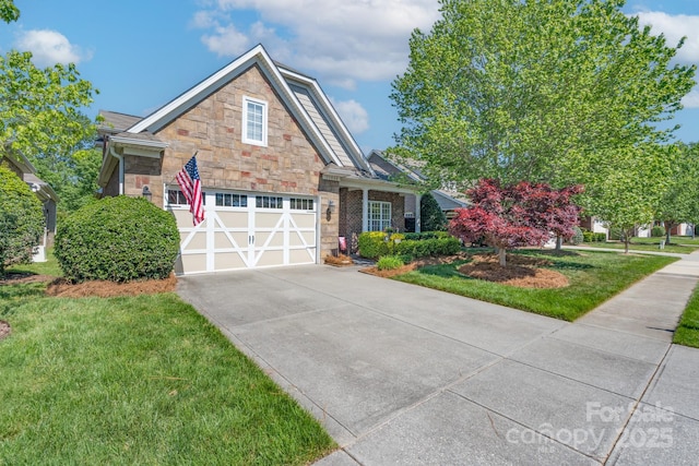 11008 Round Rock Rd, Charlotte, NC 28277 - view of front of house with concrete driveway, an attached garage, stone siding, and a front lawn