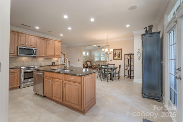 11008 Round Rock Rd, Charlotte, NC 28277 - kitchen with backsplash, visible vents, crown molding, a sink, and stainless steel appliances