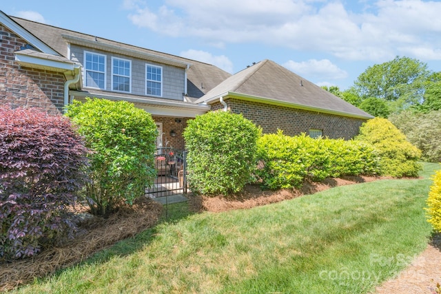 11008 Round Rock Rd, Charlotte, NC 28277 - view of side of property with a yard and brick siding