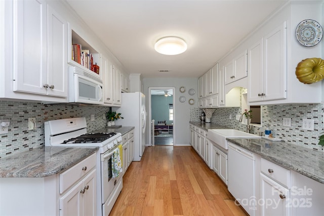 206 Summey Barker Dr, Dallas, NC 28034 - kitchen featuring white appliances, light wood-style flooring, a sink, white cabinetry, and a ceiling fan