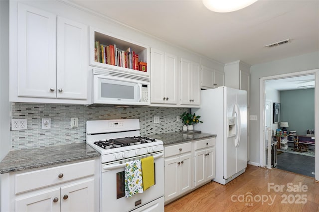 206 Summey Barker Dr, Dallas, NC 28034 - kitchen featuring white cabinetry, tasteful backsplash, white appliances, and light wood-style floors