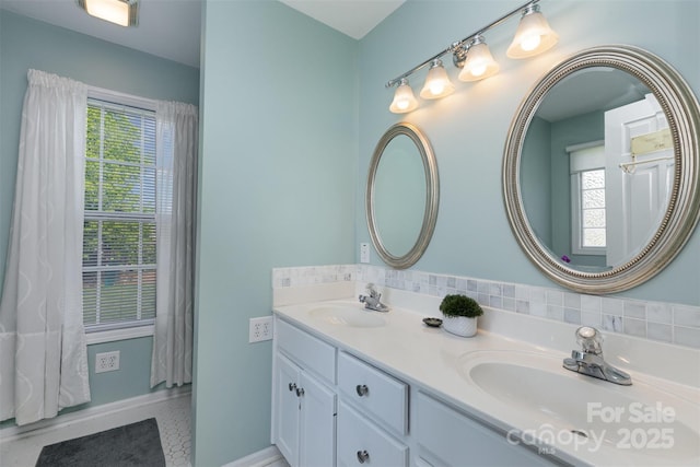 206 Summey Barker Dr, Dallas, NC 28034 - bathroom featuring baseboards, double vanity, and a sink