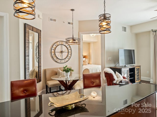 living room featuring visible vents