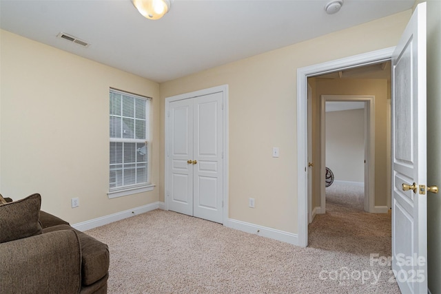 4874 Hawfield St, Kannapolis, NC 28083 - living area featuring baseboards, visible vents, and carpet