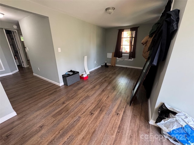 1010 Tennessee St, Kannapolis, NC 28083 - unfurnished living room featuring wood finished floors and baseboards